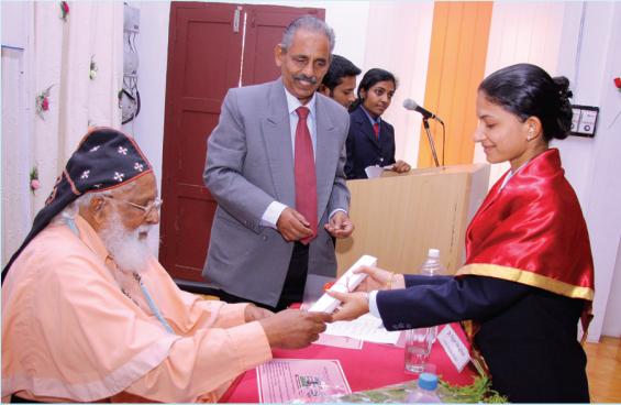 His Grace Most Rev. Dr. Philipose Mar Chrysostom Mar Thoma Valiya Metropolitan distributing course completion certificates to students.